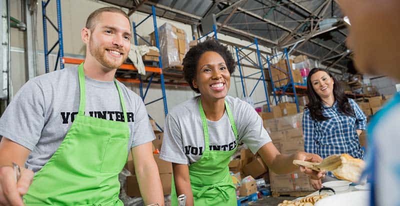 An image of a group of volunteers at a food bank.